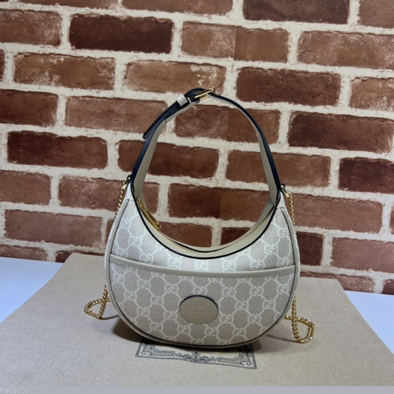 G*u*i top handle bags
